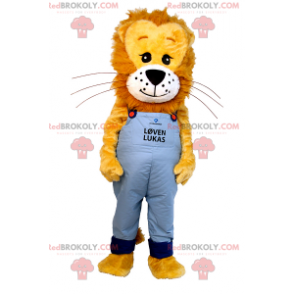 Lion maskot med behåret manke og blå overall - Redbrokoly.com