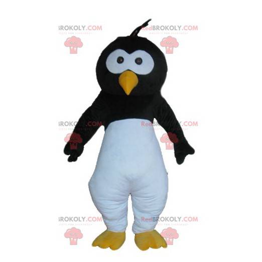 Mascota de pingüino negro pájaro blanco y amarillo -