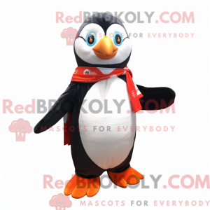 Penguin-maskotkostyme kledd...
