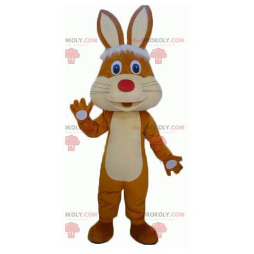 Mascotte de lapin marron et beige mignon et jovial -