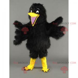 Kleine vogel mascotte met zacht zwart verenkleed -