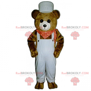 Mascot lille brun bjørn med overall og bandana - Redbrokoly.com