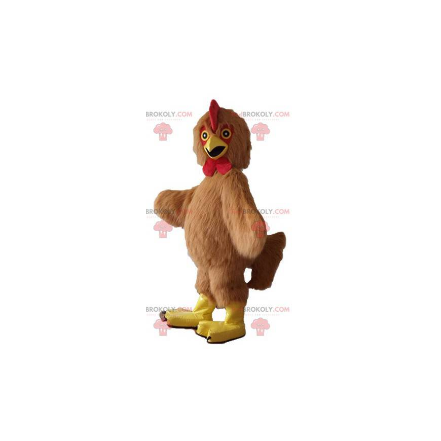 Mascotte de poule de coq marron rouge et jaune tout poilu -