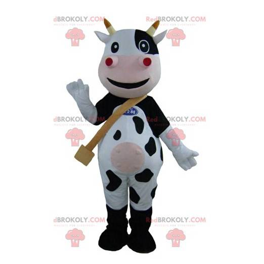 Mascote vaca preta, branca e rosa muito sorridente -