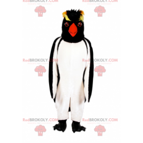 Pinguin-Maskottchen mit schwarzem und gelbem Kopf -