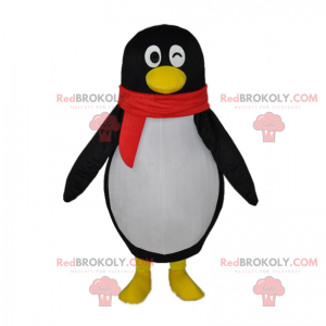 Knipogende pinguïn mascotte en rode sjaal - Redbrokoly.com