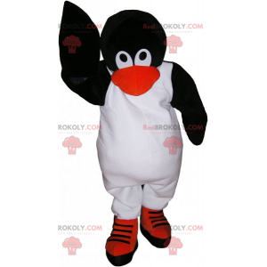 Penguin mascot on skate