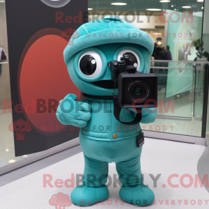Postava maskota Teal Camera...