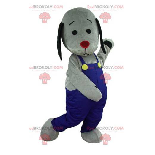 Grijze en zwarte hond mascotte met blauwe overall -