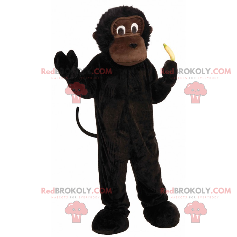 Svart apa maskot med sin lilla banan - Redbrokoly.com Svart apa maskot med sin lilla banan - Redbrokoly.com
