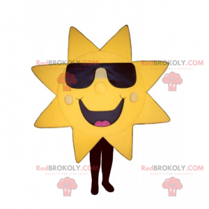 Sluneční maskot s tmavými brýlemi a velkým úsměvem -