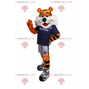 Mascote tigre em equipamento de futebol - Redbrokoly.com