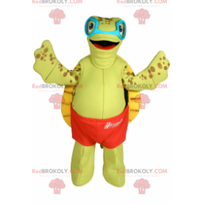 Schildkrötenmaskottchen mit Badeanzug und Sonnenbrille -