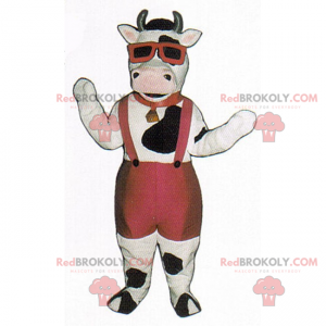 Mascota de la vaca en bermudas y tirantes - Redbrokoly.com