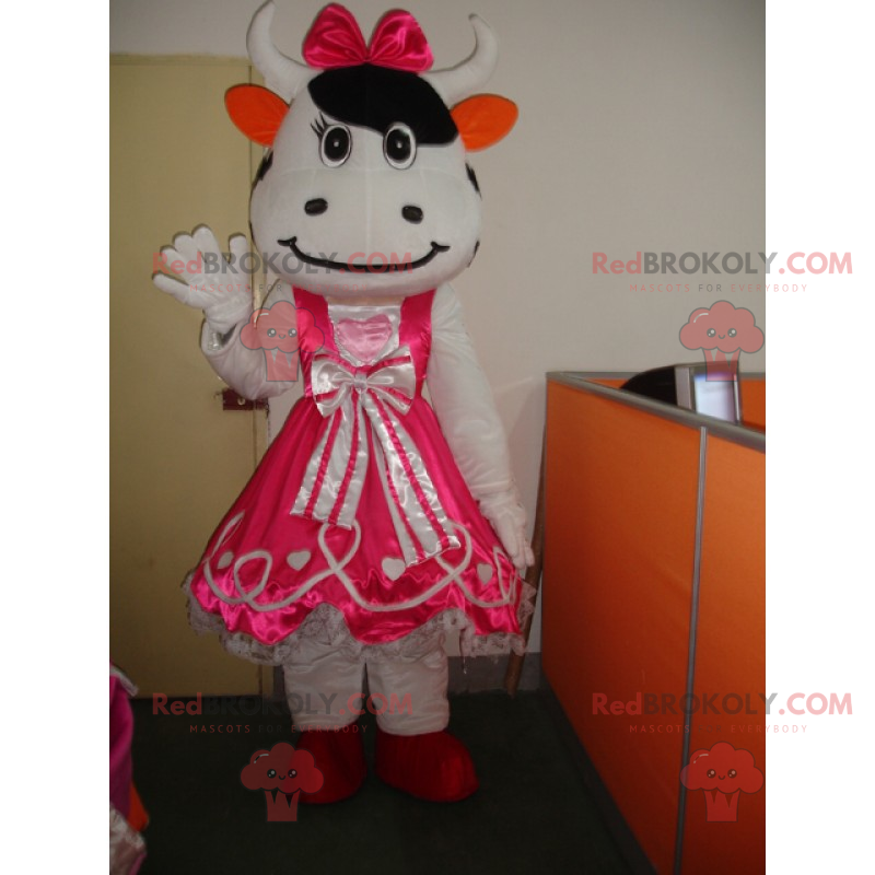 Mascota de la vaca en vestido de princesa y lazo -