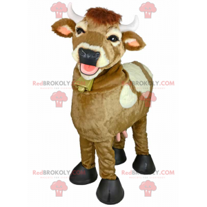 Mascota de vaca sonriente con cuello de campana - Redbrokoly.com
