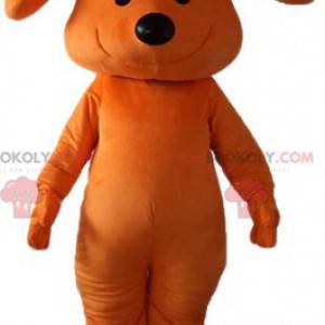 Oranžový pes maskot s úsměvem s mašlí na hlavě - Redbrokoly.com