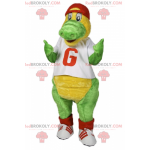 Mascote dinossauro com camiseta e boné - Redbrokoly.com