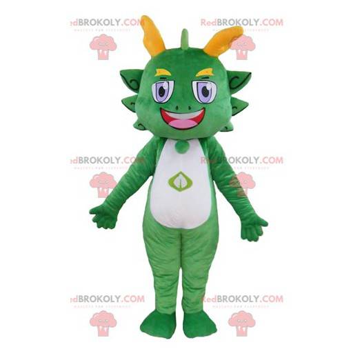 Mascotte de dragon vert et jaune coloré et souriant -