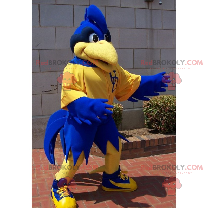 Blaues Vogelmaskottchen in der Sportbekleidung - Redbrokoly.com