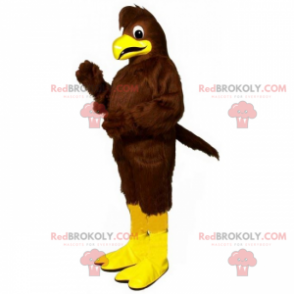 Mascota pájaro marrón y patas amarillas - Redbrokoly.com