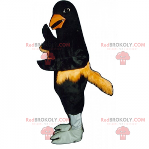 Mascotte d'oiseau noir avec plumes oranges - Redbrokoly.com