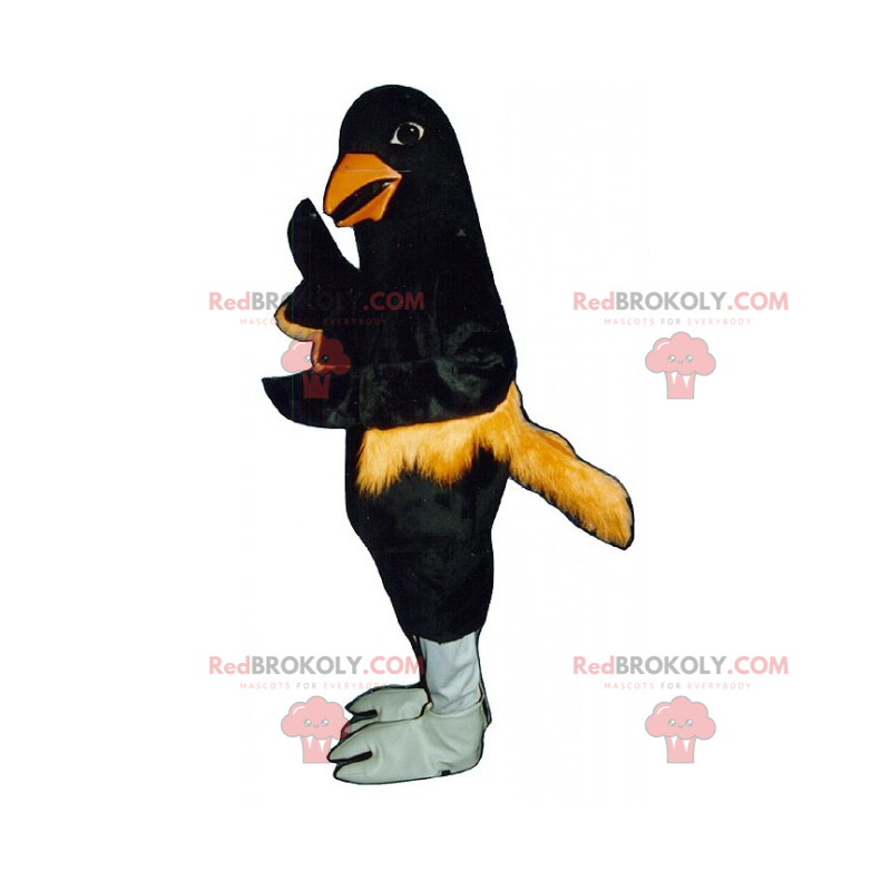 Schwarzes Vogelmaskottchen mit orangefarbenen Federn -