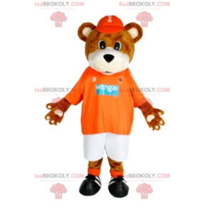 Mascote ursinho de pelúcia com boné e roupa esportiva -