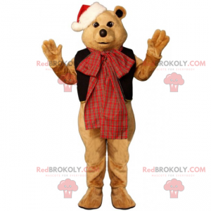 Teddy bear mascot with a bow and Christmas hat - Redbrokoly.com