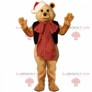 Teddy bear mascot with a bow and Christmas hat - Redbrokoly.com