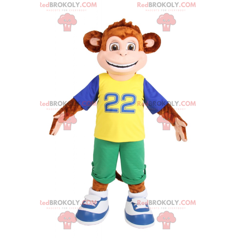 Mascotte petit singe souriant en bermuda vert - Redbrokoly.com