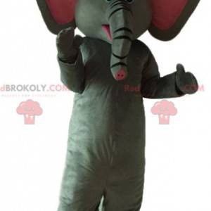 Mascote elefante cinza e rosa fofo e muito bem-sucedido -
