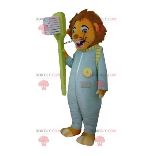 Mascota tigre con un traje y un cepillo de dientes. -