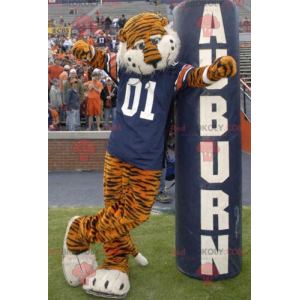 Mascote tigre laranja e preto com uma camisa azul -