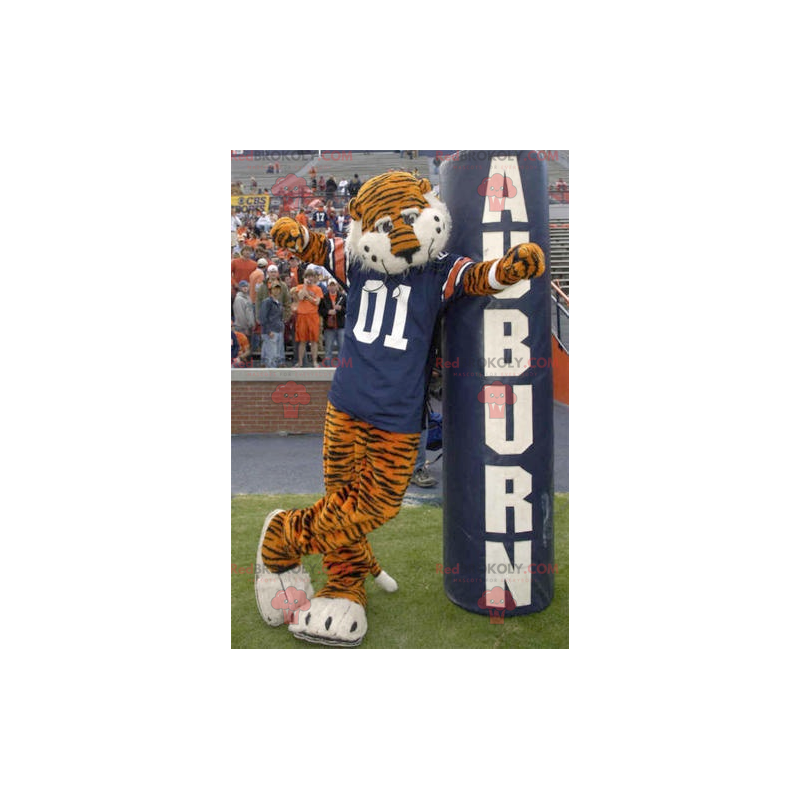 Mascota tigre naranja y negro con una camiseta azul -