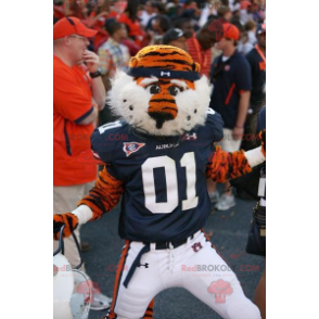 Mascotte de tigre orange et noir avec un maillot bleu -