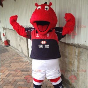 Mascota de hipopótamo rojo en ropa deportiva - Redbrokoly.com
