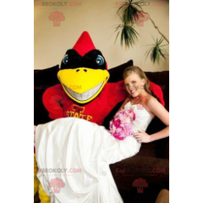 Rood geel en zwart superheld vogel mascotte - Redbrokoly.com