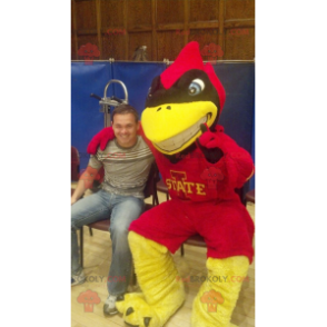 Rood geel en zwart superheld vogel mascotte - Redbrokoly.com