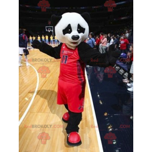 Mascotte de panda noir et blanc en tenue de sport -