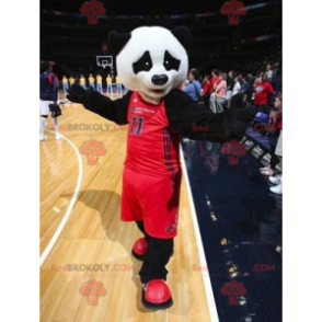 Mascotte de panda noir et blanc en tenue de sport -