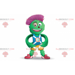 Green and red artichoke mascot in blue and yellow outfit -
