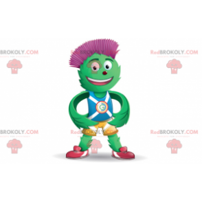 Mascote de alcachofra verde e vermelha em traje azul e amarelo