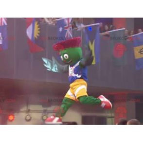 Mascote de alcachofra verde e vermelha em traje azul e amarelo