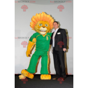 Mascota del león amarillo con una melena florida -