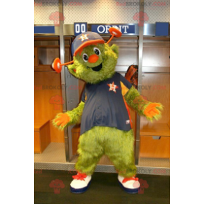 Mascota alienígena monstruo verde y naranja - Redbrokoly.com