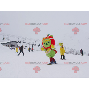 Mascota oso verde con cabeza en forma de manzana -