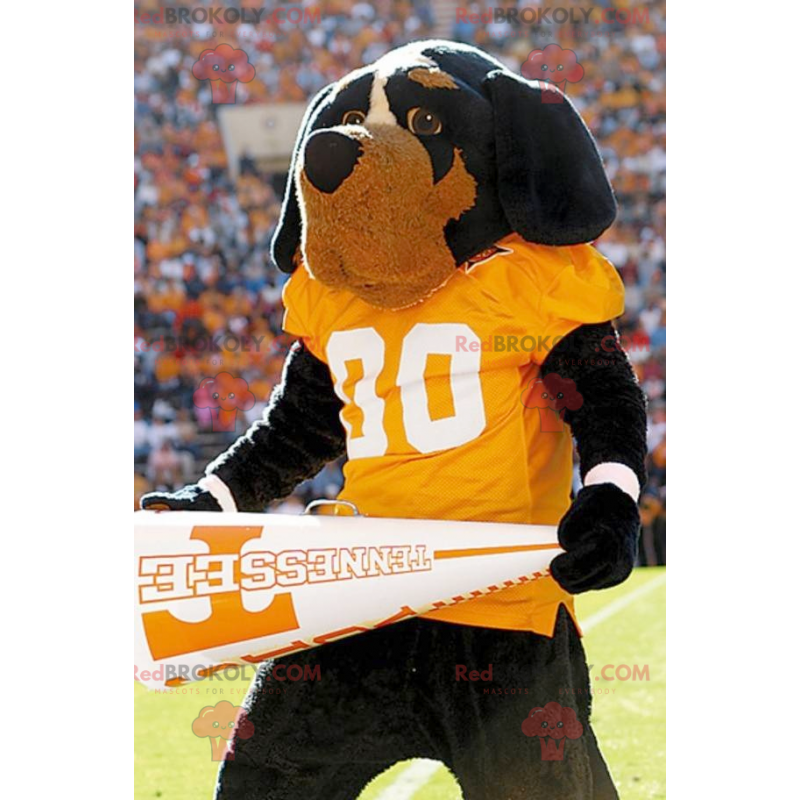 Black and brown dog mascot with a yellow t-shirt - Black and brown dog mascot with a yellow t-shirt -