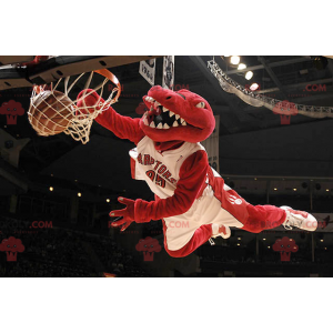 Mascote dinossauro vermelho em roupas esportivas -