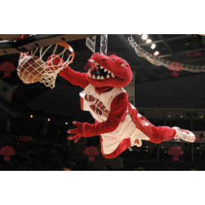 Mascote dinossauro vermelho em roupas esportivas -